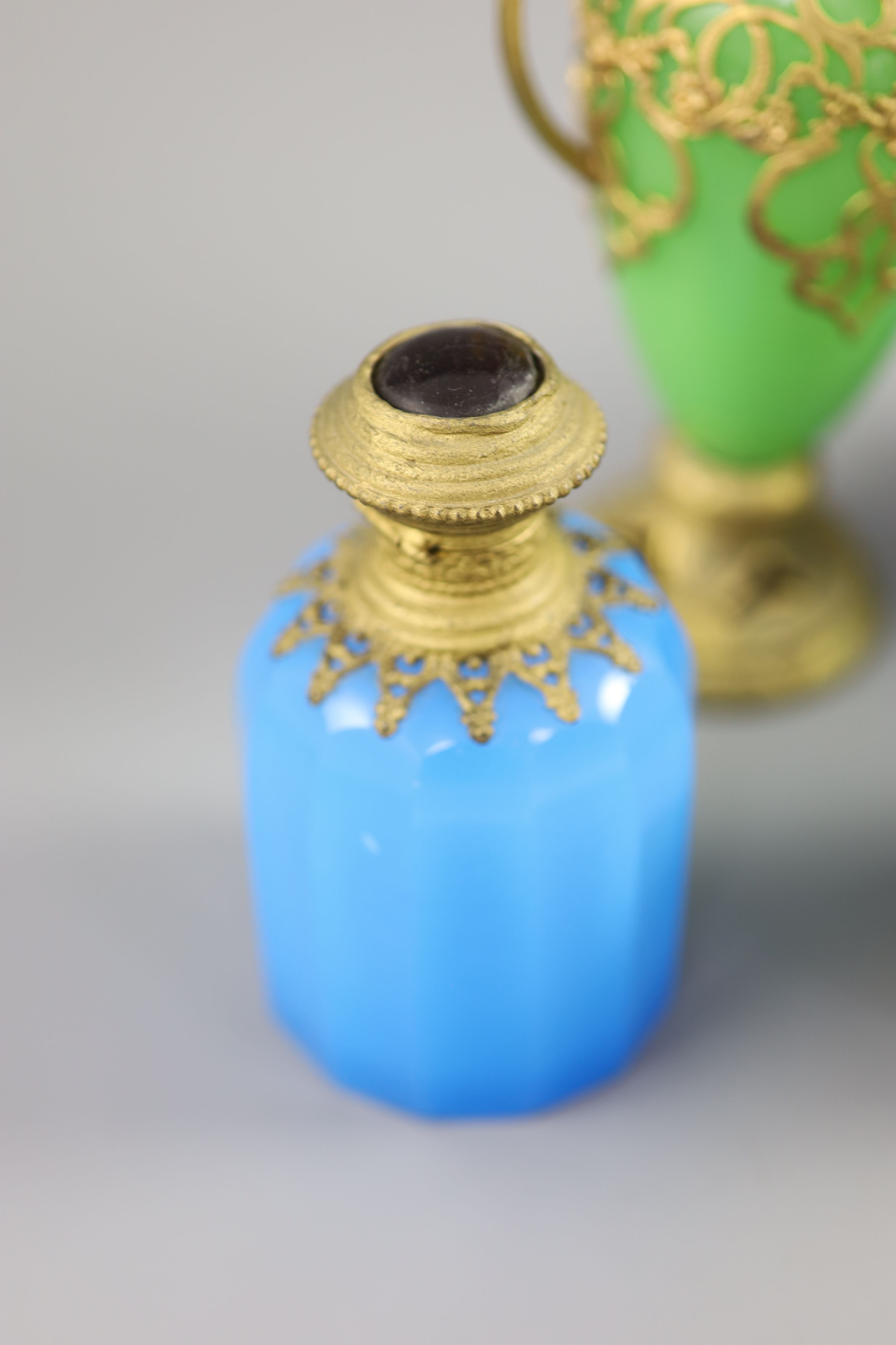 A group of French coloured opaline glass with gilt metal mounts and a satin glass vase, tallest 23.5cm